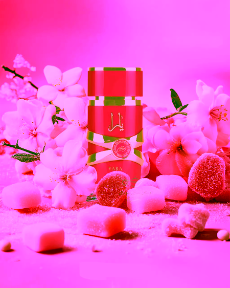 Store_01jr8z9ezh7pphtw0a28cgtpdt_assets_1744714554561-lattafa-yara-candy-perfume-bottle-photograph-against-pink-background